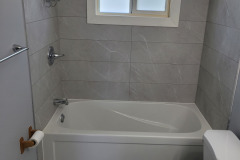 grey panels- window in shower