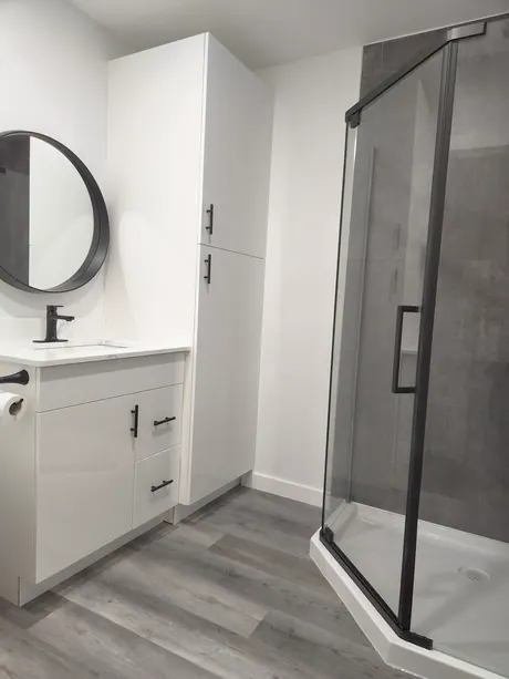 Full bathroom with a new vanity and neo-angle shower, Calgary