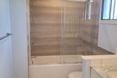 beige/grey panels -  bathtub doors
